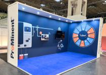 Prominent exhibition stand, 2 walls with side returns supporting roof with downlight