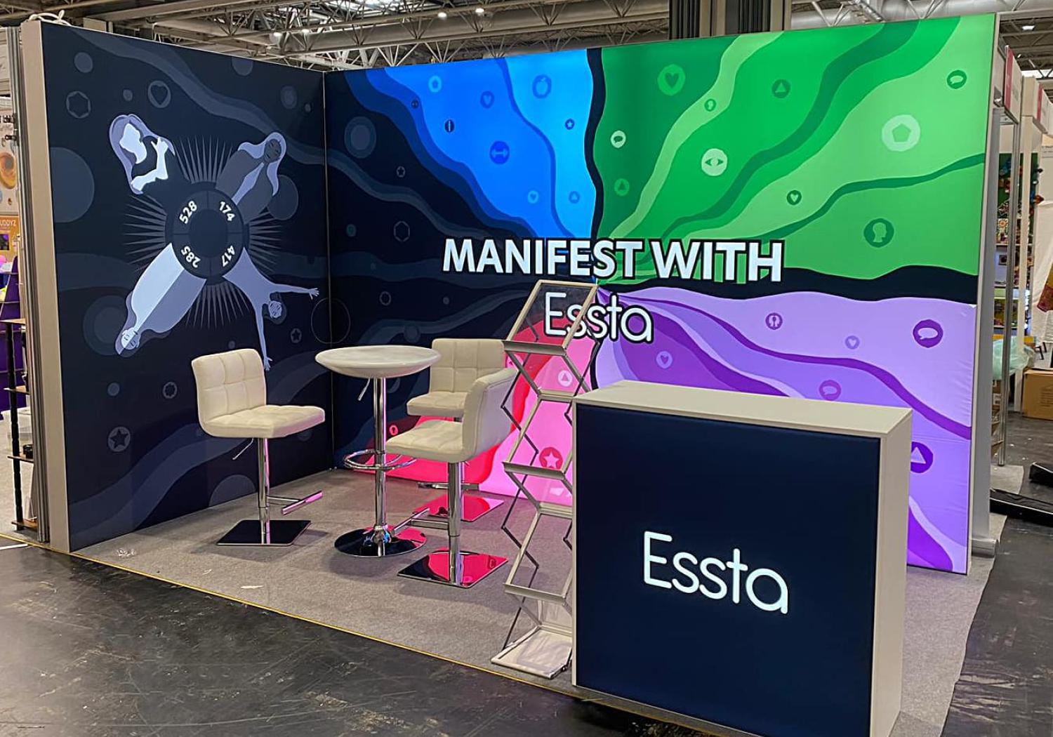 Essta back and side wall stand, with Lightbox counter and table/chairs