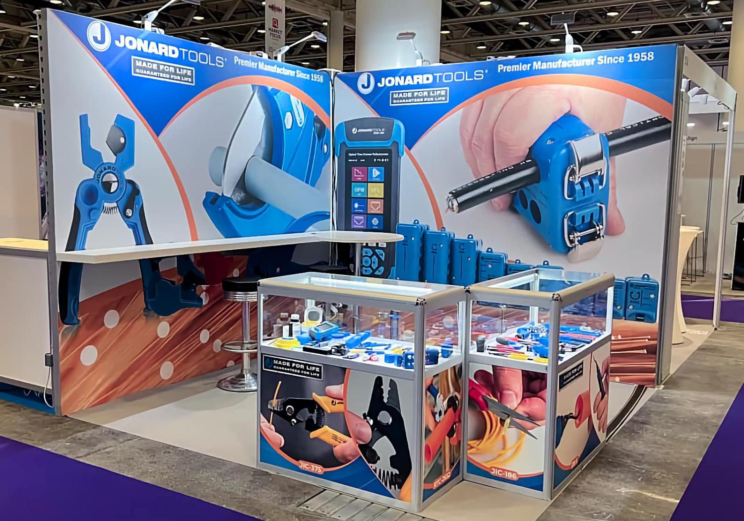 Jonard Tools stand, 2 walls with a long shelf, 2 display counters